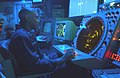 An air traffic controller watches his radar scope in the Carrier Air Traffic Control Center in 2002
