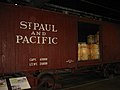 An 1879 boxcar shows how railroads transported wheat to the mills, and flour to market