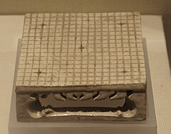 Model of a 19×19 Go board, from a tomb of the Sui dynasty (581–618 CE)
