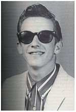 Photographic portrait of Sahm in his high school years wearing sunglasses