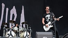 Joe Duplantier on guitar and Mario on drums onstage