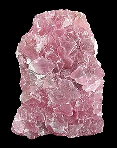 Fluorit: Massa globular pink dengan segi kristal
