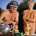 Image 36A publicity photo showing a mature naturist couple making tea. North America (from Naturism)