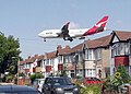 Image 34Qantas Boeing 747-400 about to land at Heathrow Airport, seen beyond the roofs of Myrtle Avenue, Hounslow.