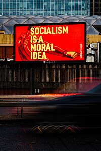 A Moral Idea: Clare Short quoted by artist Martin Firrell, Digital Billboards, UK 2019