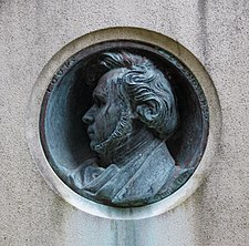 Antoine-Augustin Préault medallion on the tomb of Desnoyers in Père-Lachaise cemetery.