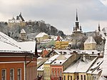 A winter view of the old town, including several spires