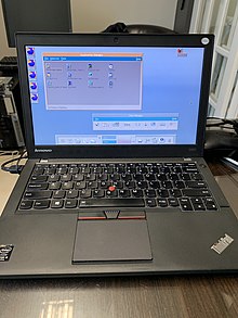 Photograph of an open X240 laptop