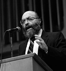 חיים פוטוק מרצה בירושלים ב-1976