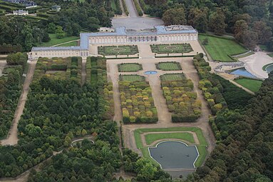 The Grand Trianon with courtyard and gardens. The wing at left is a residence of the President of France.