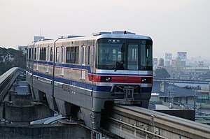 Osaka Monorail 1000 series train at Hotarugaike Station