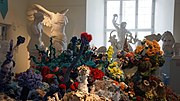 Crocheted coral reef: many animals modelled as hyperbolic planes with varying parameters by Margaret and Christine Wertheim. Föhr Reef, Tübingen, 2013