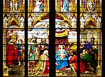 رسم على زجاج ملون يُظهر قصة ميلاد يسوع في كاتدرائية كولونيا.
