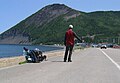 Hitchhiking on route 132 in Gaspé Peninsula, Québec, Canada.