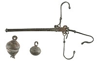 Roman steelyard balance with two bronze weights, 50–200 AD, Gallo-Roman Museum, Tongeren, Belgium