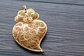 Image 7Typical Portuguese filigree heart shaped pendant, an iconic item in Portuguese fashion and design. (from Culture of Portugal)