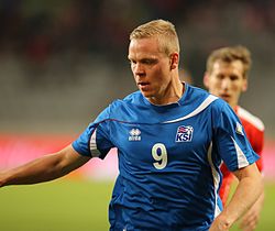 Колбейнн в форме сборной Исландии в матче против Австрии 30 мая 2014