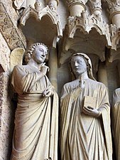 Portail de la Mère-Dieu : l'Annonciation, l'archange Gabriel et Marie.