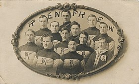 A postcard of an early ice hockey team. The players are shown from the waist up and wear a sweater with the team's logo.