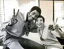 photo of Litman with her client, Connie Hawkins, in 1969, celebrating the favorable settlement of his antitrust case against the NBA text