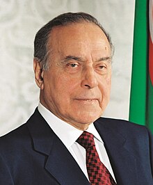 Photo of Aliyev wearing suit and tie