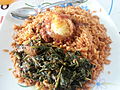 Image 43Jollof rice with vegetables and a boiled egg (from Malian cuisine)