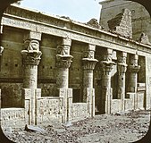 Ruins of the Philae mammisi, built by various Ptolemaic Pharaohs, in a vintage photograph.