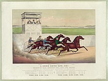 Hand-colored lithograph showing four horses pulling two-wheeled sulkies with drivers holding whips. Three men in formal dress are observing the action from a raised platform behind a white picket fence. A cloud of dust rises behind the horses, giving a sense of great speed.