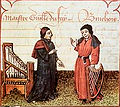 Image 37Guillaume Du Fay (left), with Gilles Binchois (right) in a c. 1440 Illuminated manuscript copy of Martin le Franc's Le champion des dames (from History of music)
