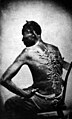 Image 18 Slavery in the United States Photo credit: McPherson and Oliver Scars of a whipped slave named Peter, photo taken at Baton Rouge, Louisiana, 1863. In his own words, "Overseer Artayou Carrier whipped me. I was two months in bed sore from the whipping. My master come after I was whipped; he discharged the overseer." The slave pictured here escaped from a plantation in Mississippi, made his way to Union forces, and joined the U.S. Army at the Union garrison located at Baton Rouge. Slavery in the United States began soon after the English colonists first settled in North America. From about the 1640s until 1865, people of African descent were legally enslaved within the boundaries of the present U.S. mostly by whites, but also by a comparatively tiny number of American Indians and free blacks. By 1860, the slave population in the U.S. had grown to 4 million. More featured pictures