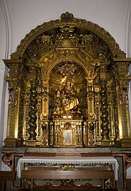 Retablo de la capilla de Santa Ana en la Iglesia de Santa Cruz (Sevilla), de Bernardo Simón de Pineda, Valdés Leal y Pedro Roldán, 1670-1672. En la misma iglesia se hallan otros notables retablos.