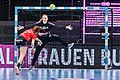 Julia Maidhof, 16 mai 2021. Maidhof (nr. 27, în roșu și negru) în timpul partidei dintre HL Buchholz 08-Rosengarten și SG BBM Bietigheim, din cadrul turneului OLYMP Final4 a Cupei Germaniei ediția 2020-2021, desfășurat în Porsche-Arena din Stuttgart.