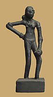 Dancing girl statue from Mohenjo-daro, with one arm completely filled with bangles.