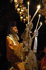 Patriarca Teófilo III de Jerusalén (ortodoxo griego). Hay otros tres patriarcas de Jerusalén: el armenio y dos en comunión con Roma (latino y melquita).