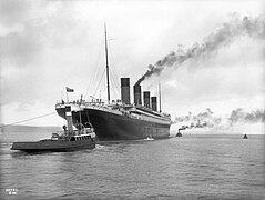 Titanic with tugboats, doing sea trials in 1912
