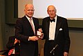 The 2nd Viscount (right), receiving the Canning Medal from William Hague in 2013
