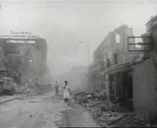 Street with destroyed buildings on both sides