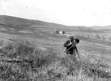 Milton Manaki filming with Bioscope Camera 300 in a valley