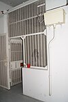 A photograph of a prison cell