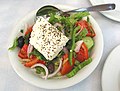 Choriatiki, a Greek salad typically served at a taverna.