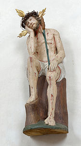 Ecce Homo (лат. «бу адамды»). Вилландро'да (Италия) Сыйлы Маврикийни боялгъан агъач статуясы