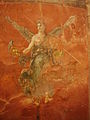 Tiivulise naise kujutisega fresko Pompeis