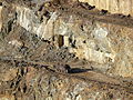 Zooming in further, one can see that the object is an abandoned steam locomotive. (Click through for a larger image.)