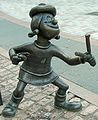 Image 28Statue of Minnie the Minx, a character from The Beano, in Dundee, Scotland. Launched in 1938, The Beano is known for its anarchic humour, with Dennis the Menace appearing on the cover. (from Culture of the United Kingdom)