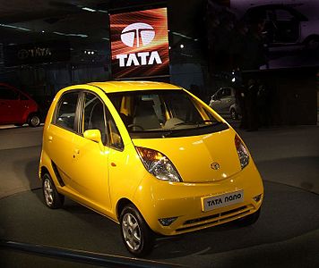 Shown here is the Tata Nano, the world's least expensive car.[163] Sanand, Gujarat, is home to Tata Nano.