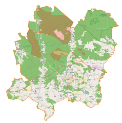 Mapa konturowa powiatu bolesławieckiego, blisko centrum na dole znajduje się punkt z opisem „Filiał w Bolesławcu, Parafia Ewangelicko-Augsburska w Lubaniu”