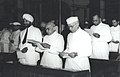Jawaharlal Nehru and other members taking pledge during the midnight session of the Constituent Assembly of India held on 14 and 15 August 1947.
