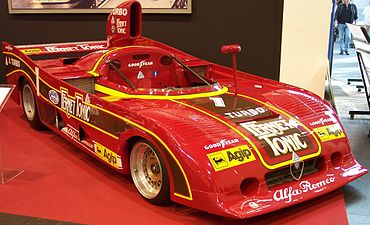 An Alfa Romeo Sports Racing car in 1977, painted Rosso Corsa ("racing red"), the traditional racing color of Italy from the 1920s until the late 1960s.