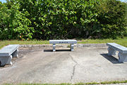 Granite memorial benches on the southern edge of the launch pad
