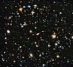 Ultra-Profunda Kampo de Hublo en 2014 bildo entenanta ĉirkaŭ dek mil galaksiojn